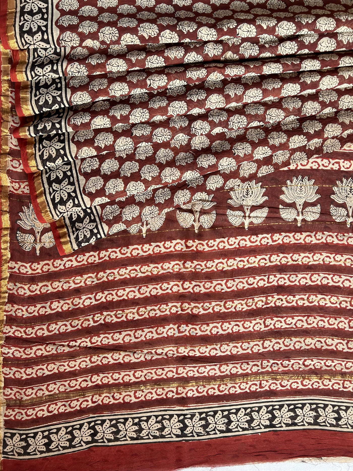 SUNAINA: HANDBLOCK BAGRU PRINT CHANDERI SILK-COTT SAREE WITH ZARI BORDER.