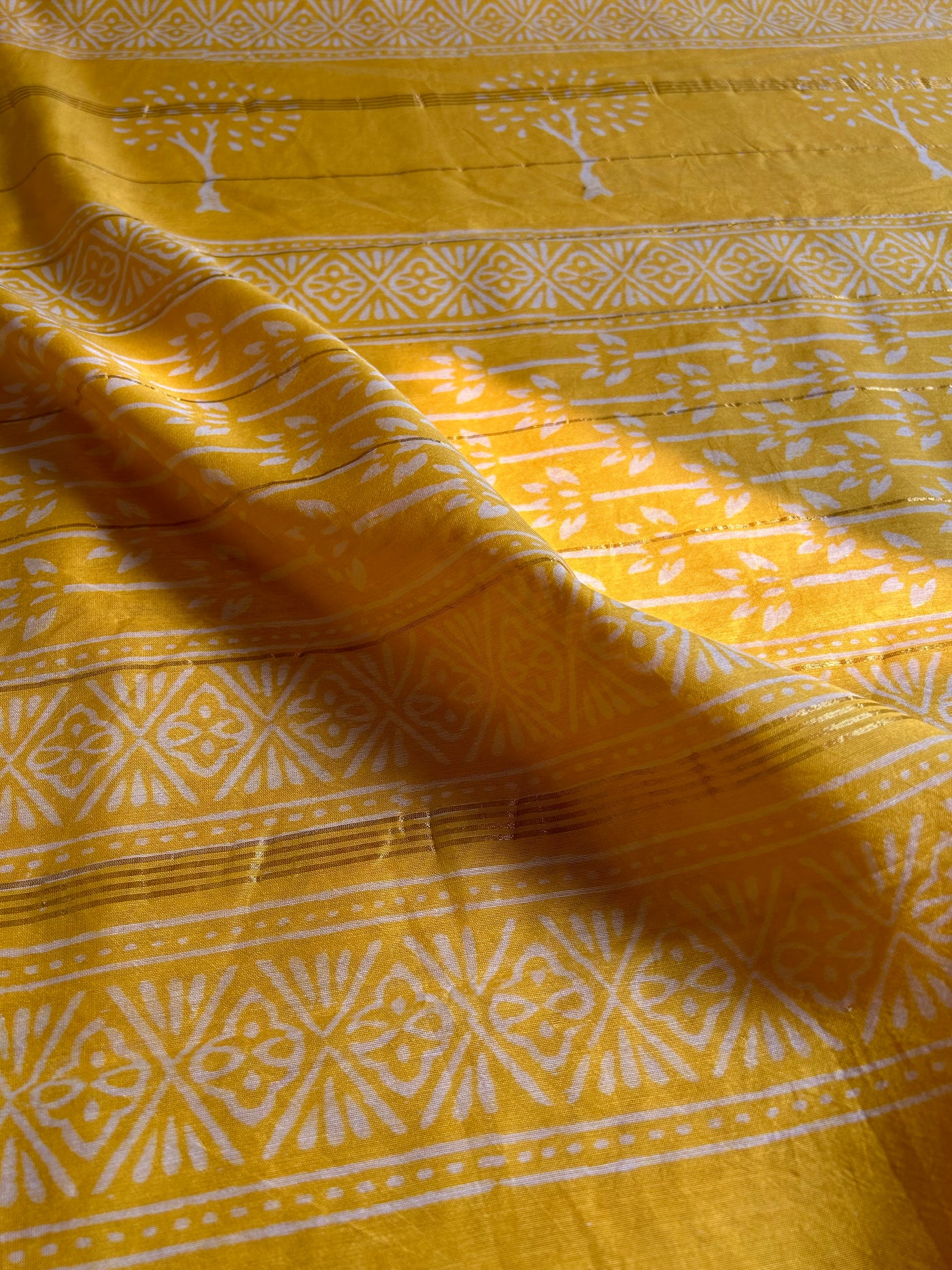 KHUSBOO: HANDBLOCK BAGRU PRINT CHANDERI SILK-COTT SAREE WITH ZARI BORDER.