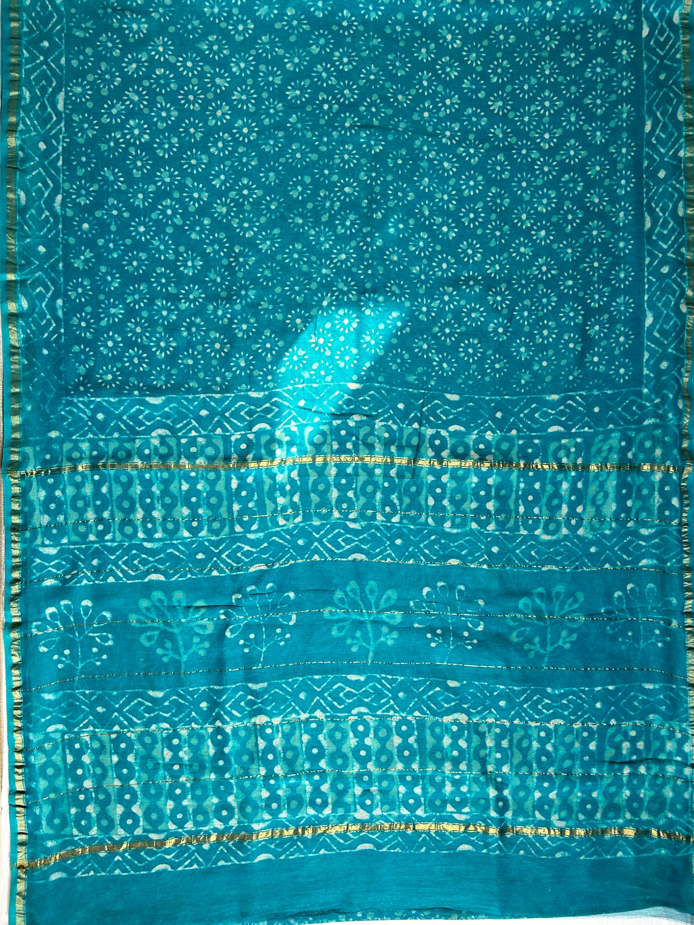 KANGNA : HANDBLOCK BAGRU PRINT CHANDERI SILK-COTT SAREE WITH ZARI BORDER.