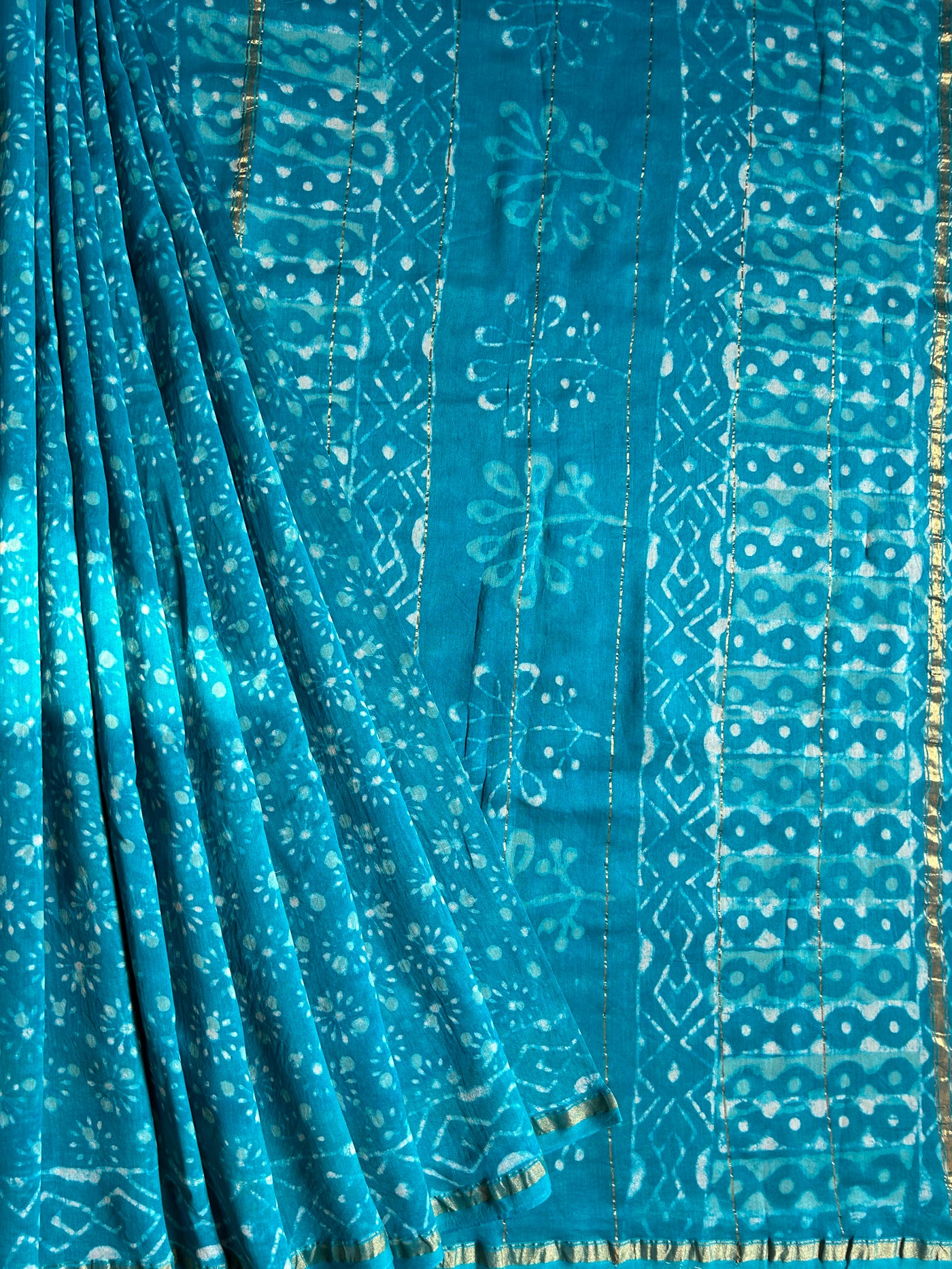 KANGNA : HANDBLOCK BAGRU PRINT CHANDERI SILK-COTT SAREE WITH ZARI BORDER.