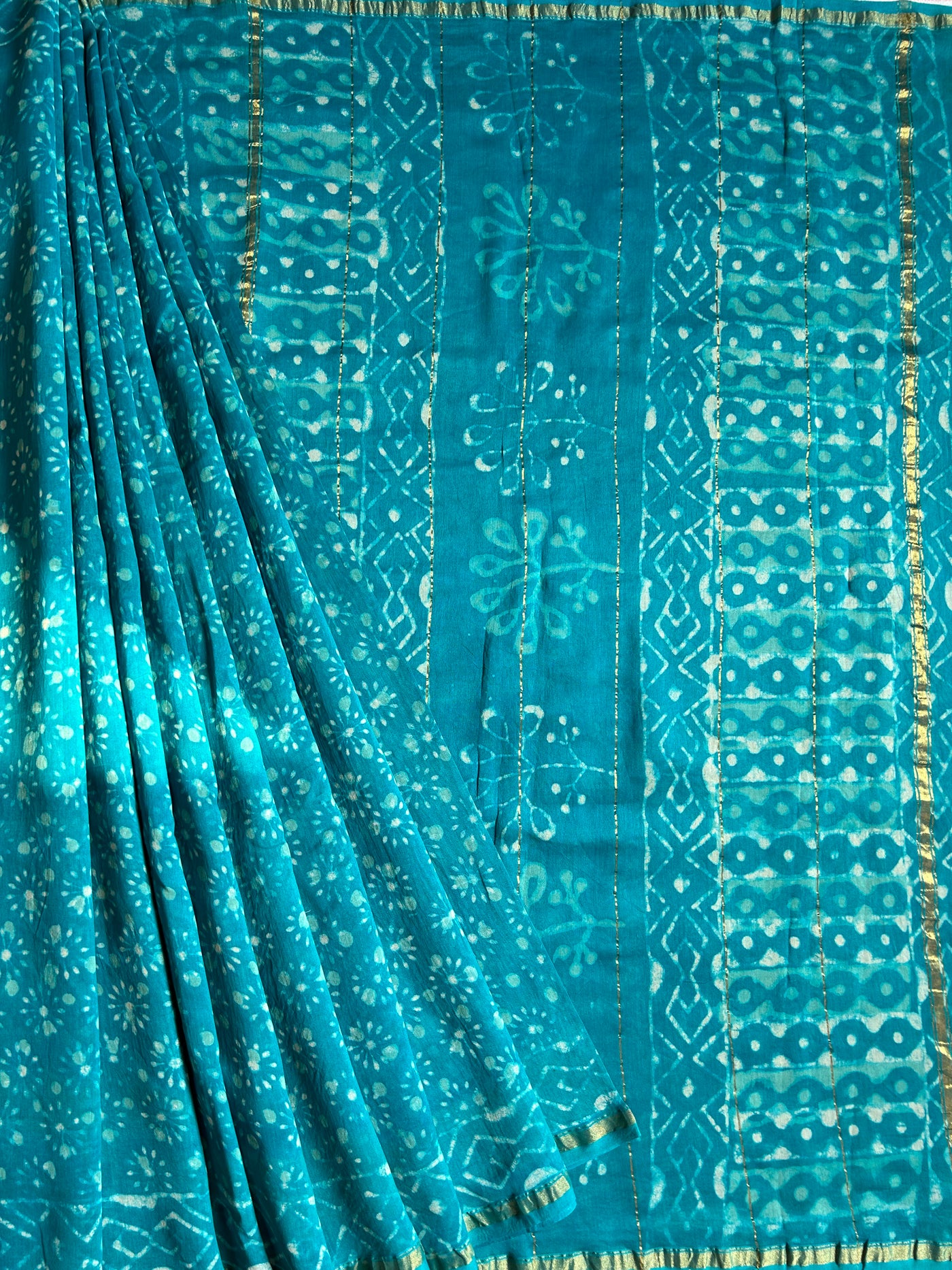 KANGNA : HANDBLOCK BAGRU PRINT CHANDERI SILK-COTT SAREE WITH ZARI BORDER.