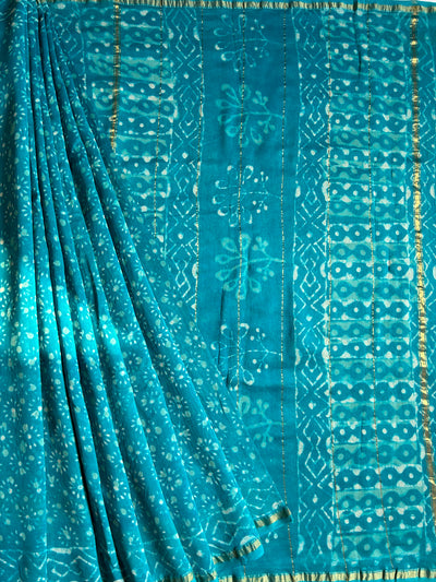 KANGNA : HANDBLOCK BAGRU PRINT CHANDERI SILK-COTT SAREE WITH ZARI BORDER.