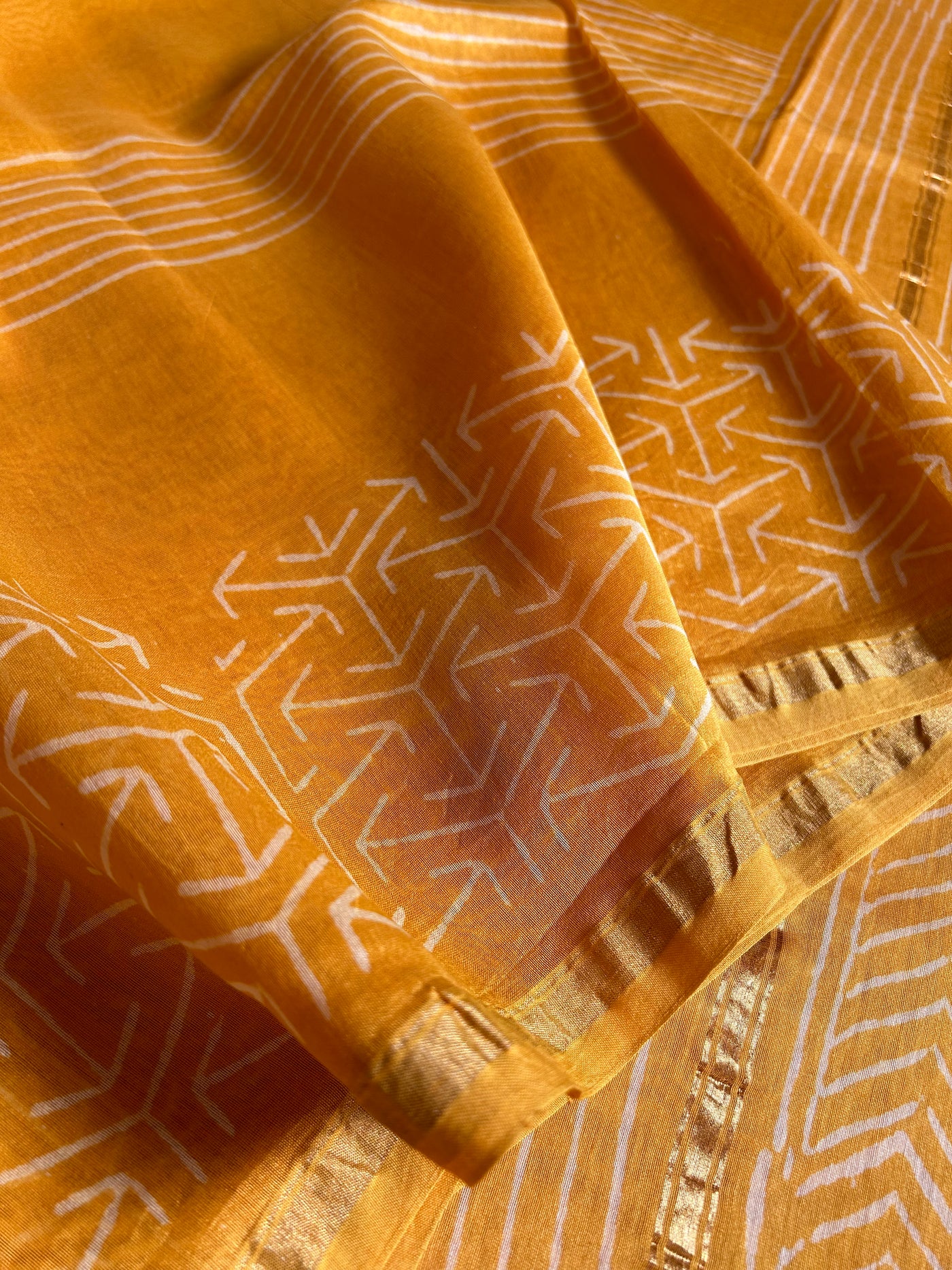 SUKNA: HANDBLOCK BAGRU PRINT CHANDERI SILK-COTT SAREE WITH ZARI BORDER.