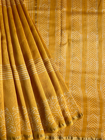 SUKNA: HANDBLOCK BAGRU PRINT CHANDERI SILK-COTT SAREE WITH ZARI BORDER.