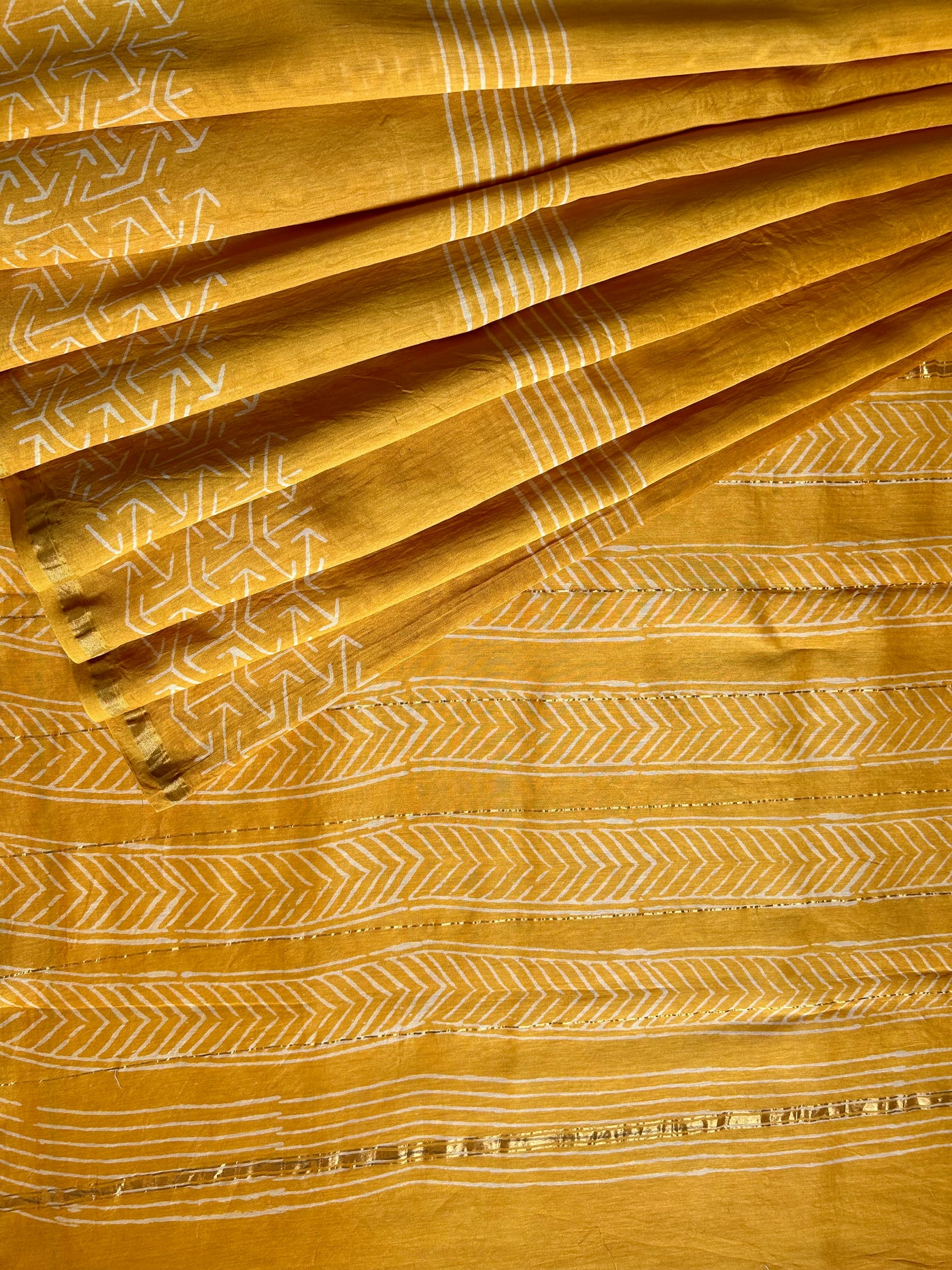 SUKNA: HANDBLOCK BAGRU PRINT CHANDERI SILK-COTT SAREE WITH ZARI BORDER.