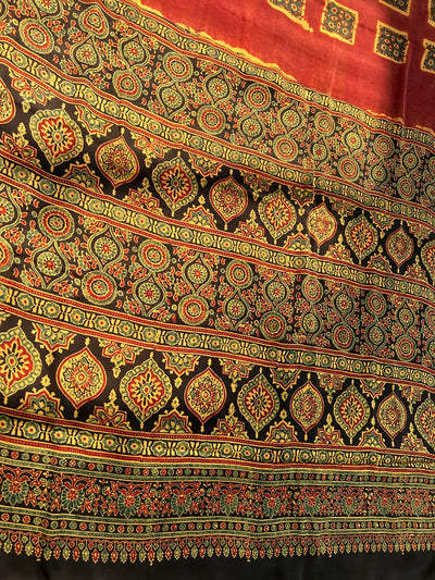 INAYA: Handmade Clamp Dyed- Ajrakh Modal Silk Saree