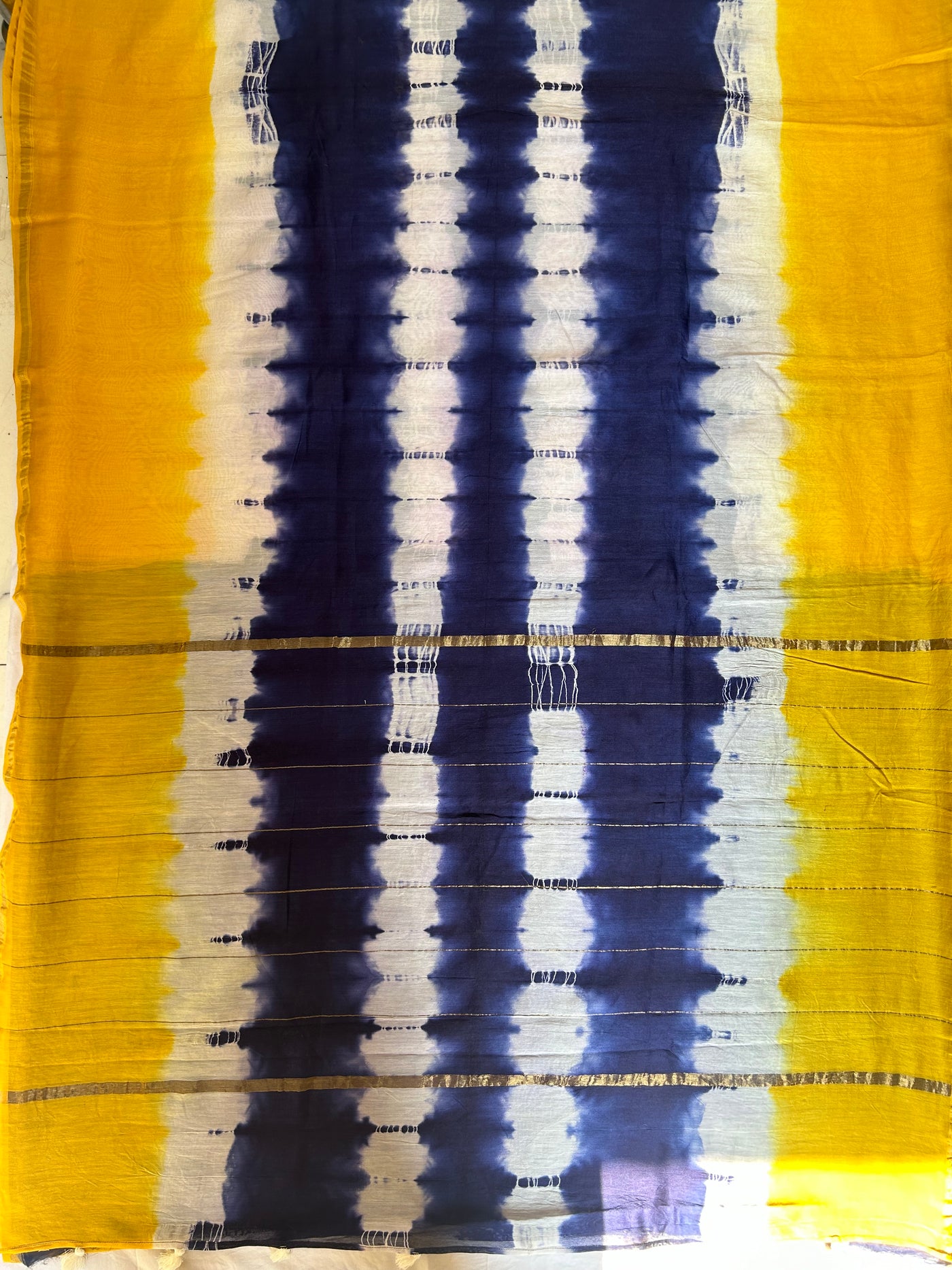 FALAK: HANDMADE TIE DYE CHANDERI SILK-COTT SAREE WITH ZARI BORDER.