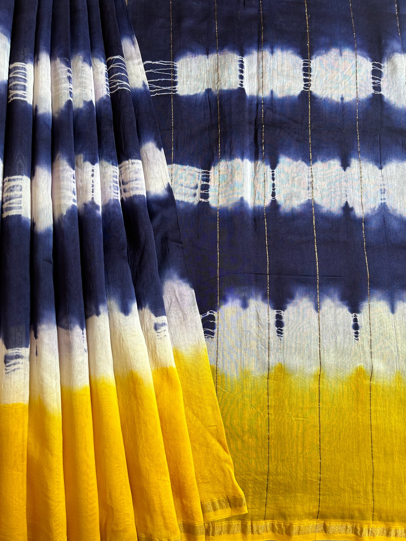 FALAK: HANDMADE TIE DYE CHANDERI SILK-COTT SAREE WITH ZARI BORDER.