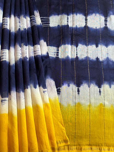 FALAK: HANDMADE TIE DYE CHANDERI SILK-COTT SAREE WITH ZARI BORDER.