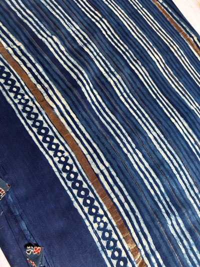 GARGI: HANDBLOCK BAGRU PRINT CHANDERI SILK-COTT SAREE WITH ZARI BORDER.