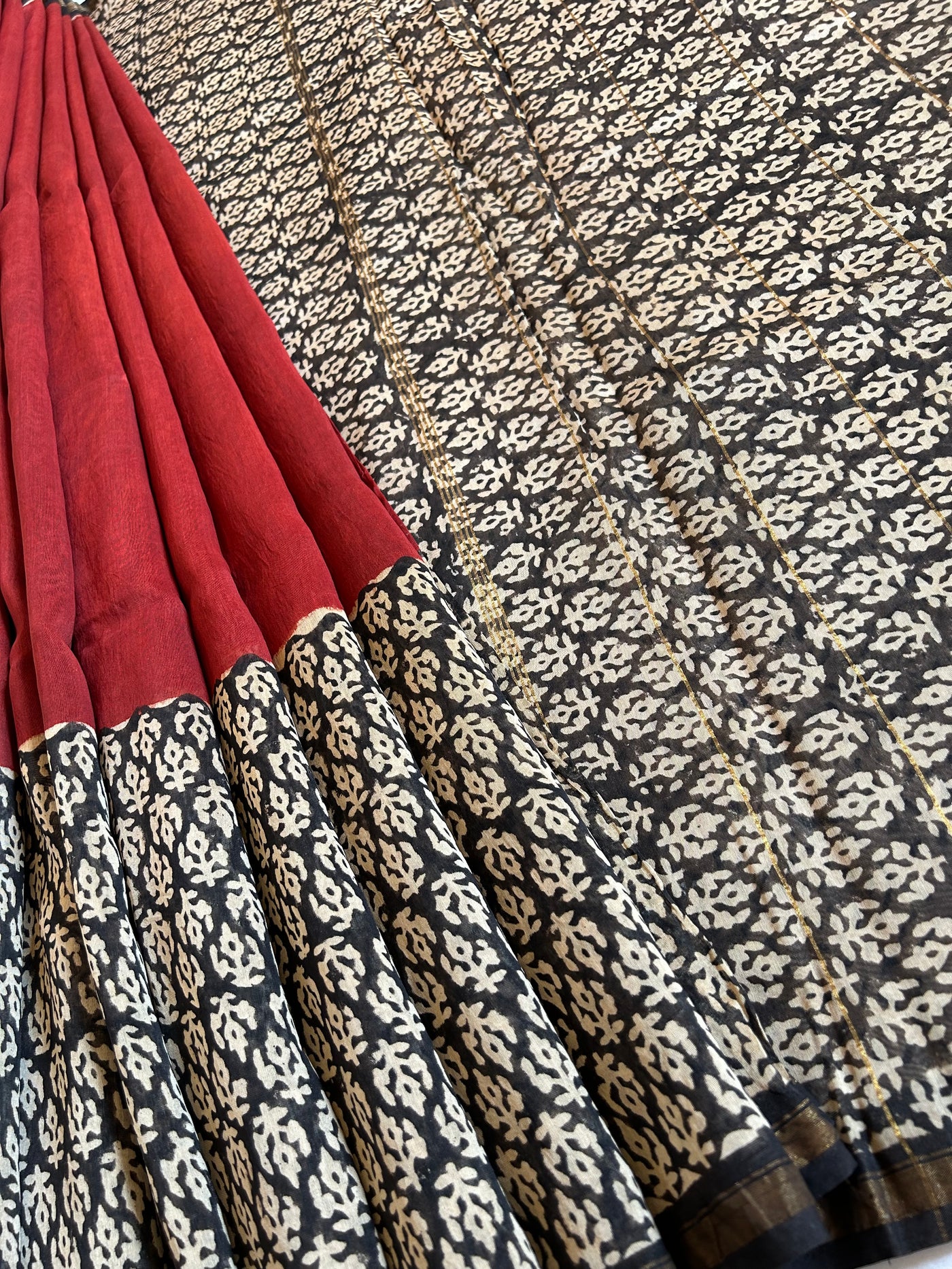 FAGUNI: HANDBLOCK BAGRU PRINT CHANDERI SILK-COTT SAREE WITH ZARI BORDER.