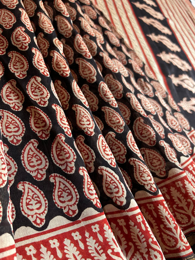 PRKATI: HANDBLOCK BAGRU PRINT CHANDERI SILK-COTT SAREE WITH ZARI BORDER.