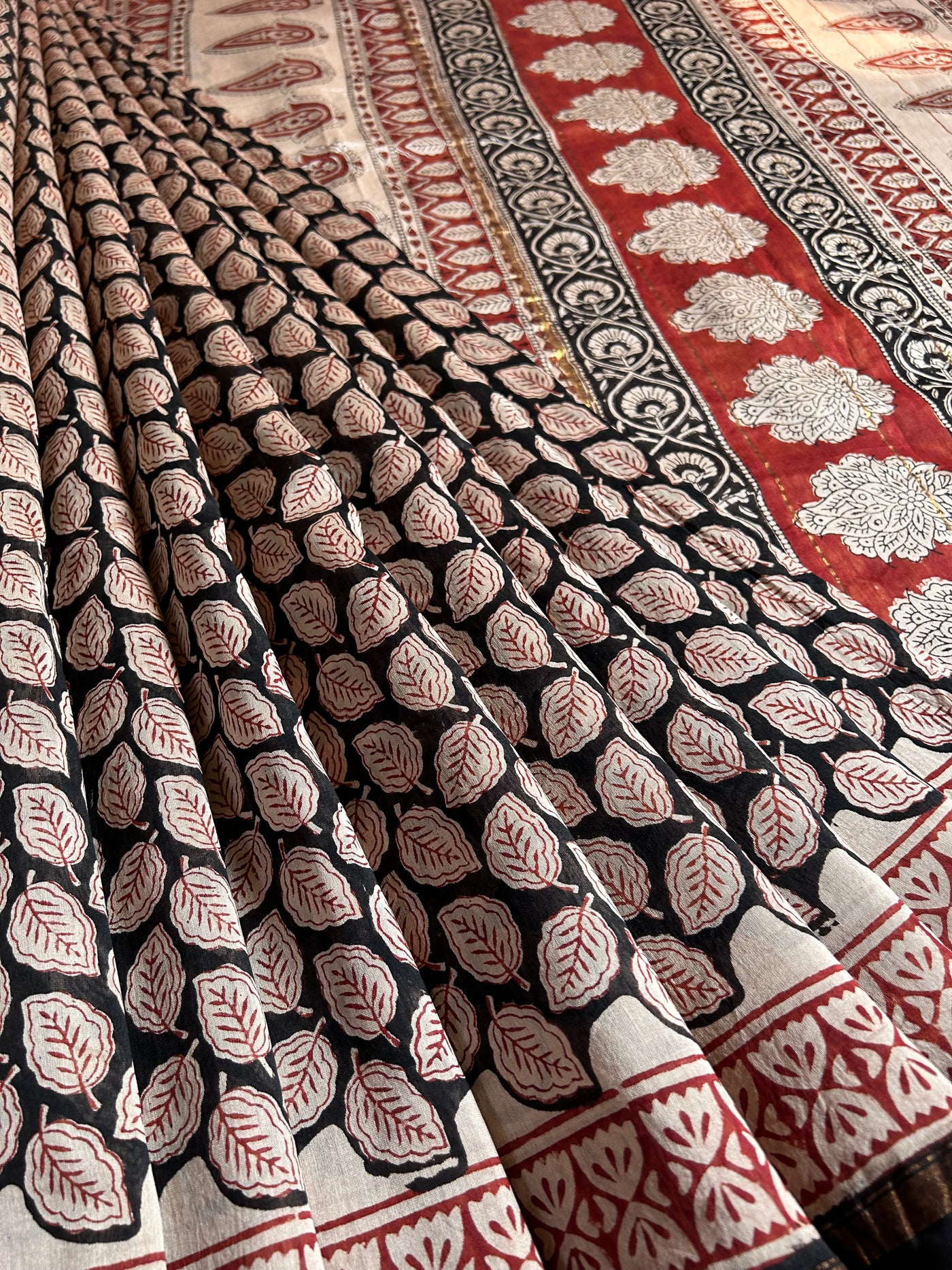 SITARA: HANDBLOCK BAGRU PRINT CHANDERI SILK-COTT SAREE WITH ZARI BORDER.