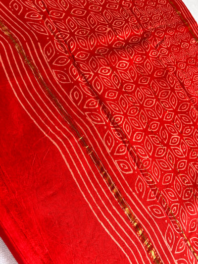 SANA: HANDBLOCK BAGRU PRINT CHANDERI SILK-COTT SAREE WITH ZARI BORDER.