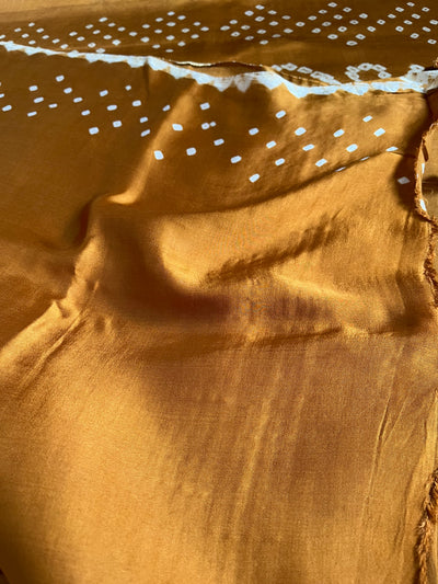 ANANDITA: Handmade Bandhani saree with tissue palla