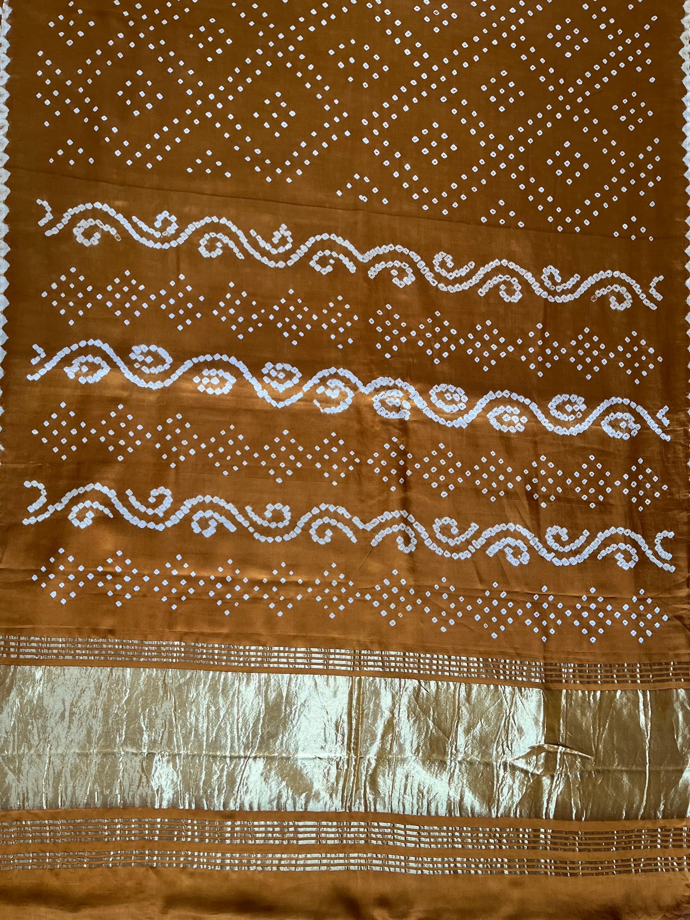 ANANDITA: Handmade Bandhani saree with tissue palla