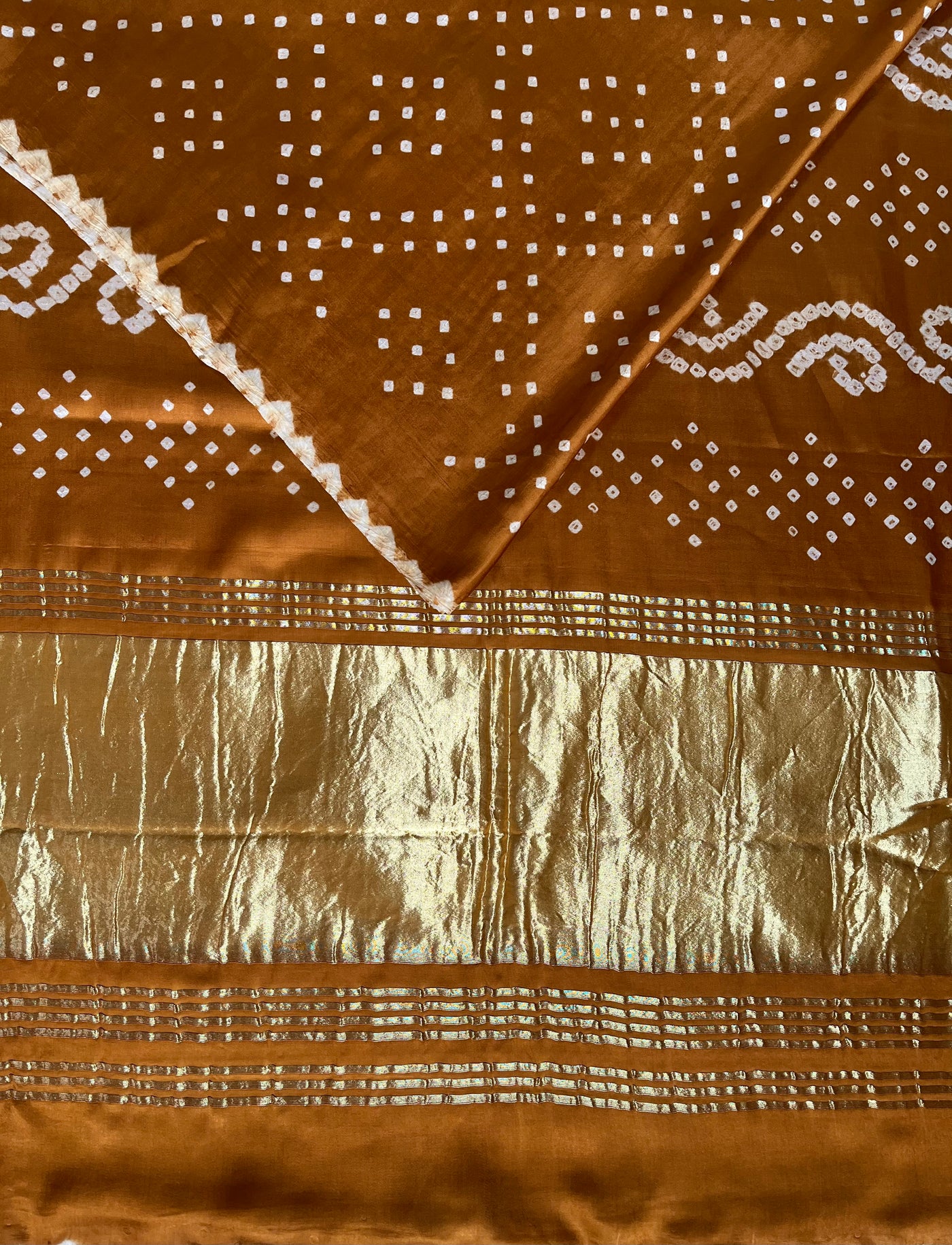 ANANDITA: Handmade Bandhani saree with tissue palla