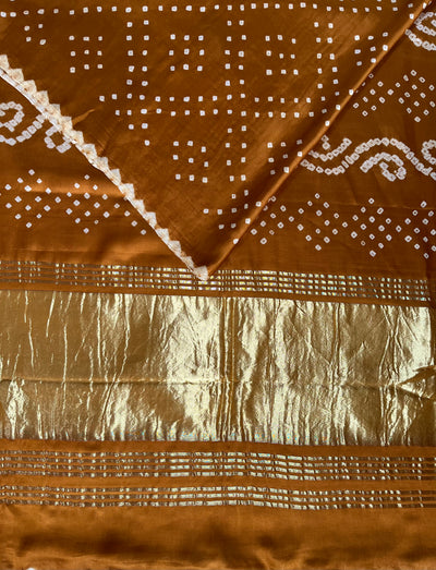 ANANDITA: Handmade Bandhani saree with tissue palla