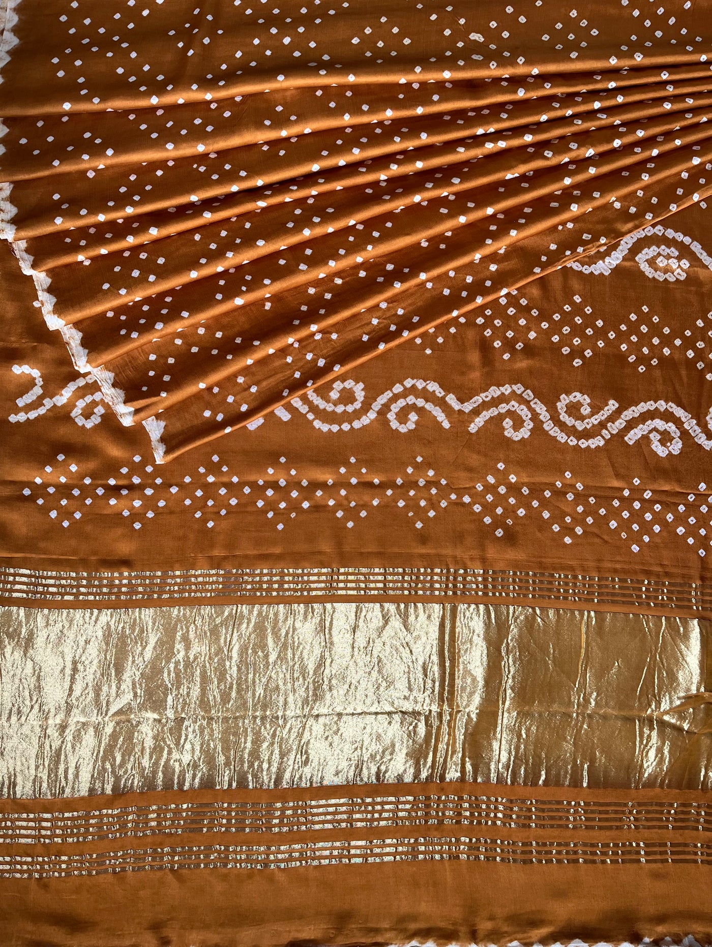 ANANDITA: Handmade Bandhani saree with tissue palla