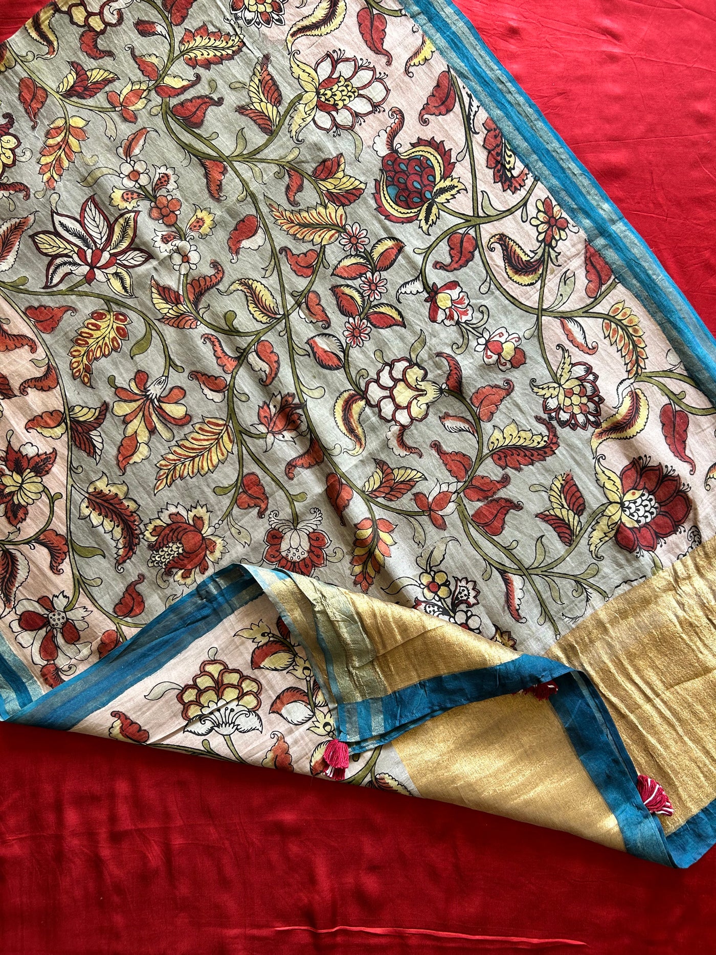 PHOOL:MAROON,HANDDRAWN&HANDPAINTED PENKALAMKARI CHANDERI TISSUE DUPATTA WITH DYED MODAL SILK SUIT SET