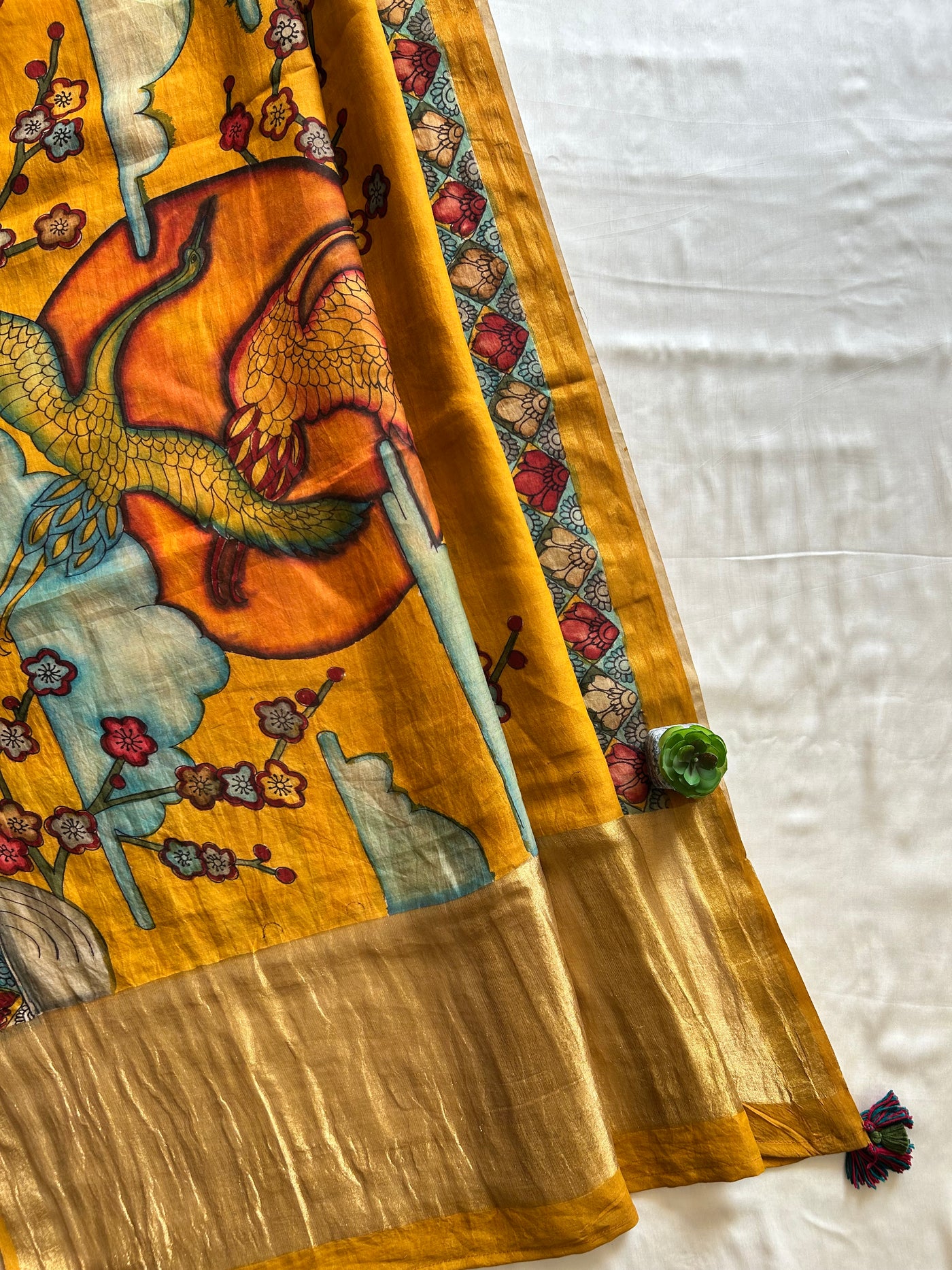 VARNIKA:CREAM,HANDDRAWN&HANDPAINTED PENKALAMKARI CHANDERI TISSUE DUPATTA WITH DYED MODAL SILK SUIT SET
