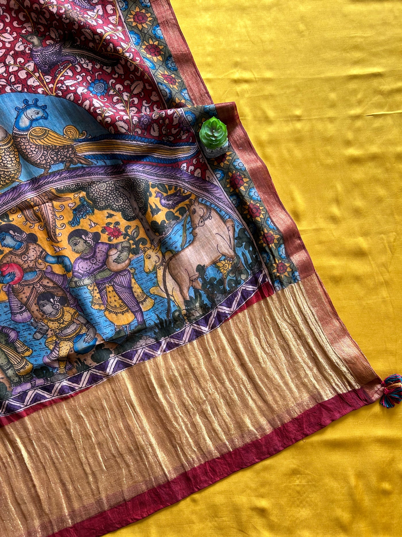 RANGKRITI: TURMURIC,HANDDRAWN&HANDPAINTED PENKALAMKARI CHANDERI TISSUE DUPATTA WITH DYED MODAL SILK SUIT SET