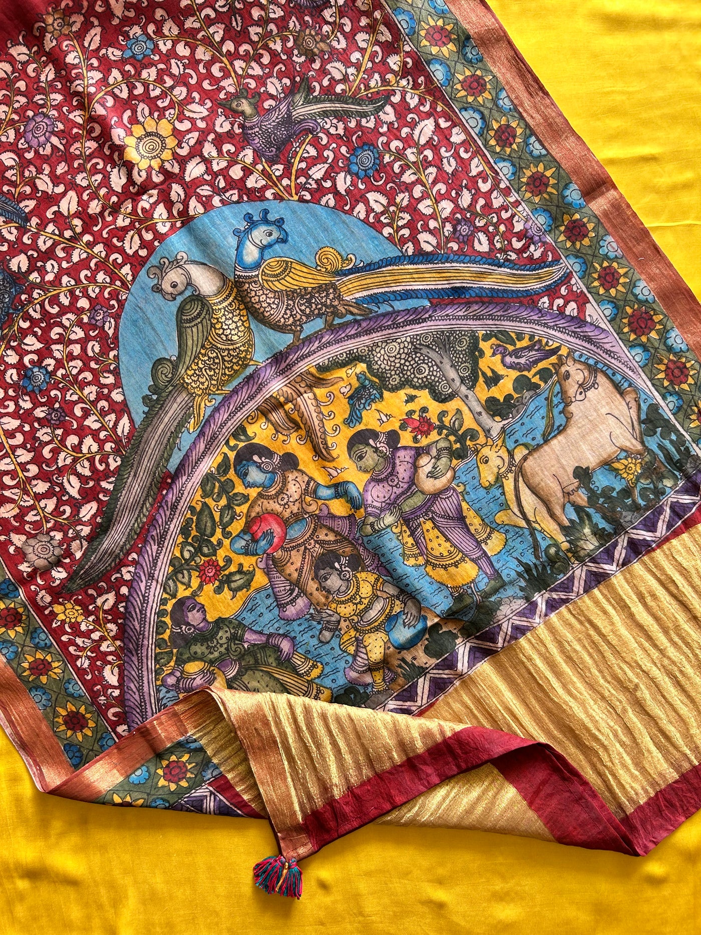 RANGKRITI: TURMURIC,HANDDRAWN&HANDPAINTED PENKALAMKARI CHANDERI TISSUE DUPATTA WITH DYED MODAL SILK SUIT SET