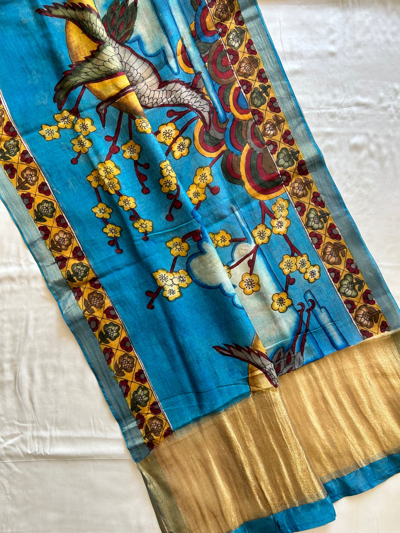 PARINDE: CREAM,HANDDRAWN&HANDPAINTED PENKALAMKARI CHANDERI TISSUE DUPATTA WITH DYED MODAL SILK SUIT SET
