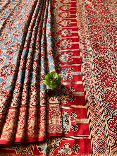 SUNDARI:Handmade Ajrakh Dola Silk Saree with Meenakari Pallu