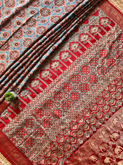 SUNDARI:Handmade Ajrakh Dola Silk Saree with Meenakari Pallu