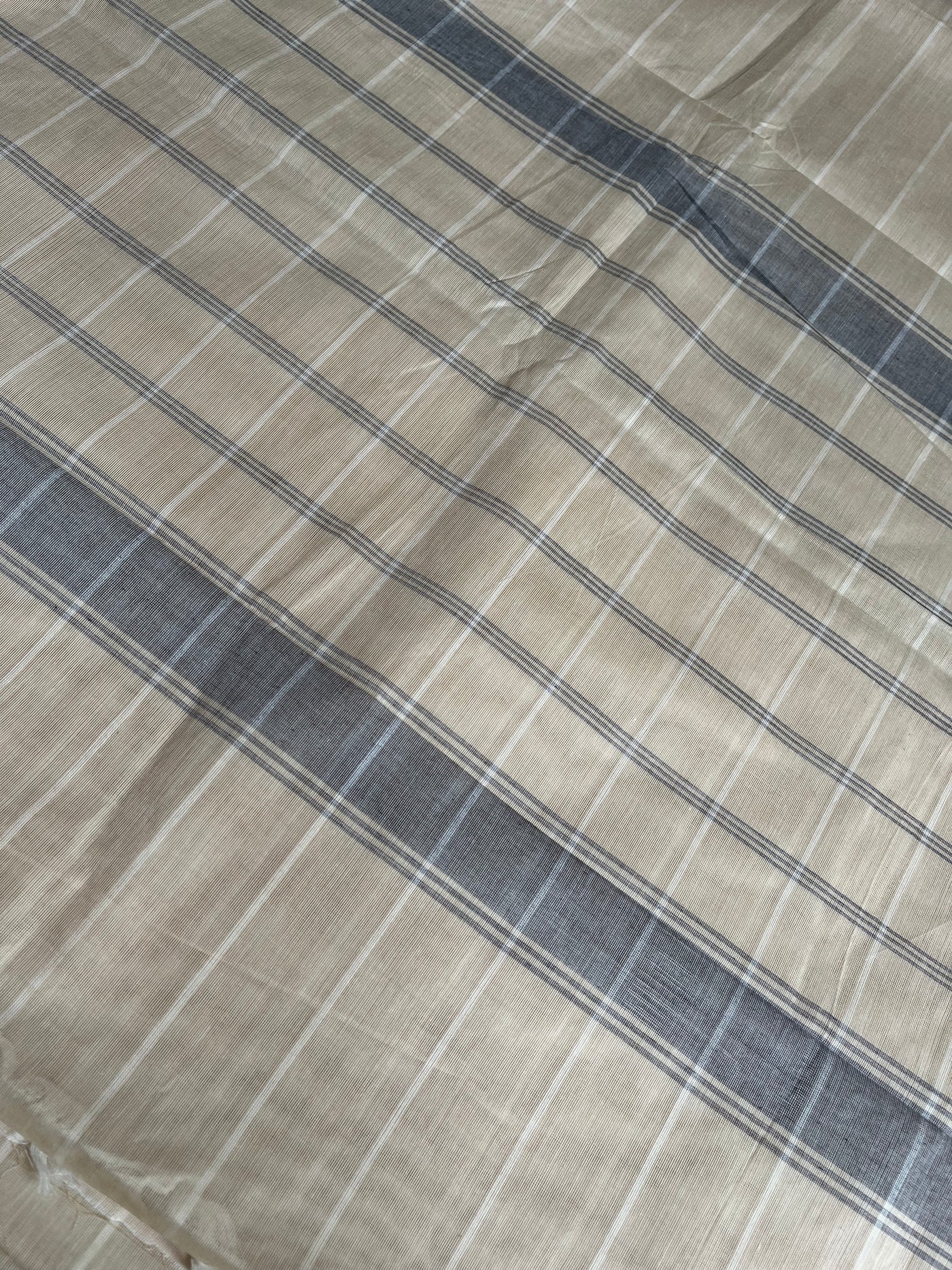 KAVERI: KANCHIPURAM PURE COTTON SAREE WITH BORDERS.