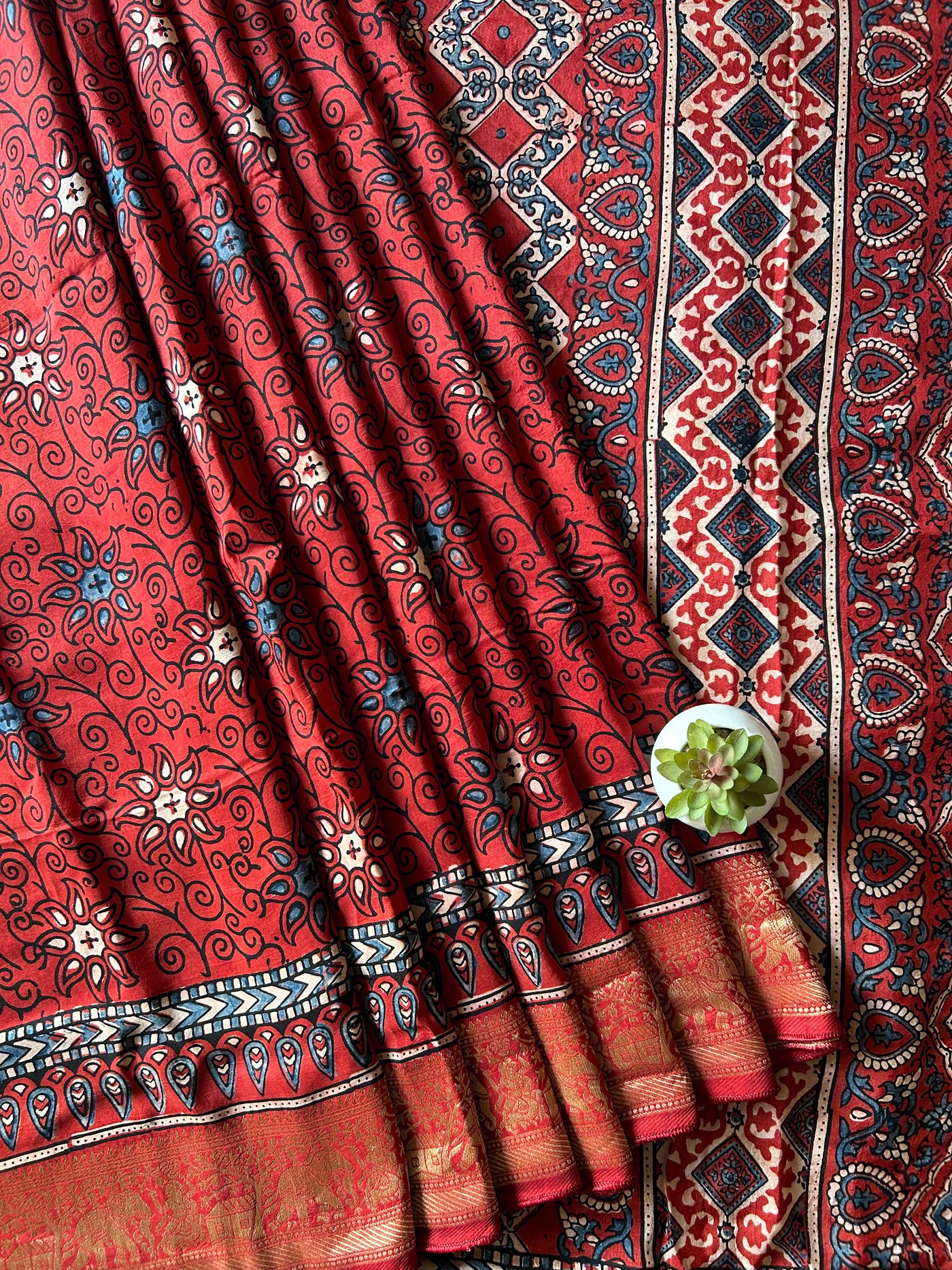 kumkum:Handblock Ajrakh Dola Silk Saree With Meenakari Pallu.