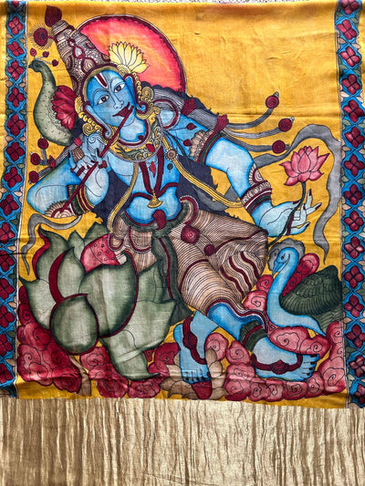 KRISHNA:turmuric yellow,Hand drawn&Hand painted penkalamkeri silk-cott tissue dupatta.