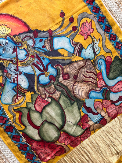 KRISHNA:turmuric yellow,Hand drawn&Hand painted penkalamkeri silk-cott tissue dupatta.