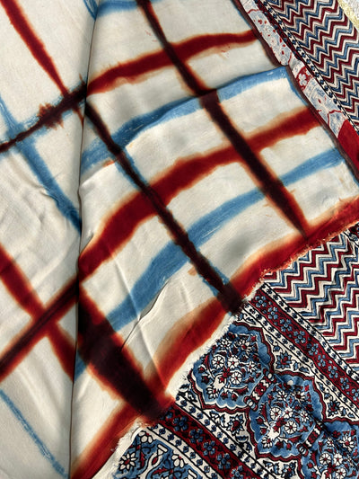 MYRA: Handmade Clamp Dyed- Ajrakh Modal Silk Saree