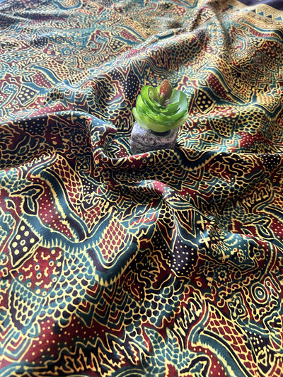 KAJARI:BOTTLE GREEN,HAND BLOCK AJRAKH MODAL SILK SAREE