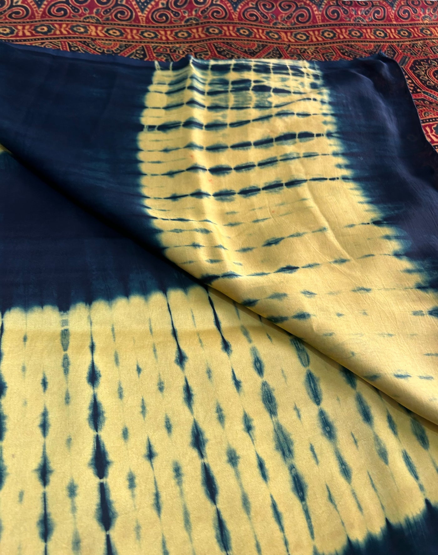 PAKHI: Handmade Clamp Dyed- Ajrakh Modal Silk Saree