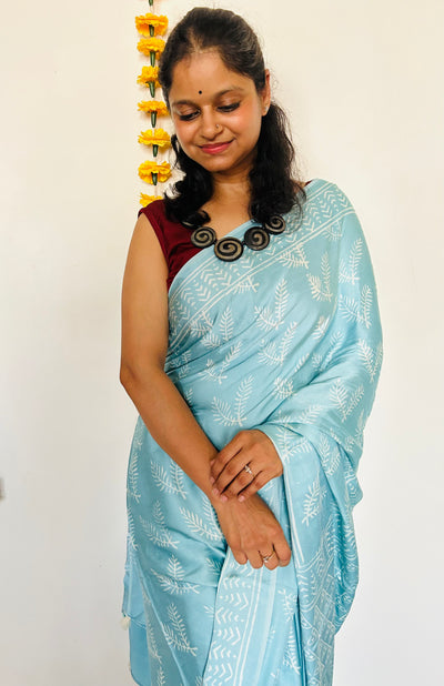 NEELAM: HANDBLOCK BAGRU PRINTED ICE BLUE MODAL SILK SAREE