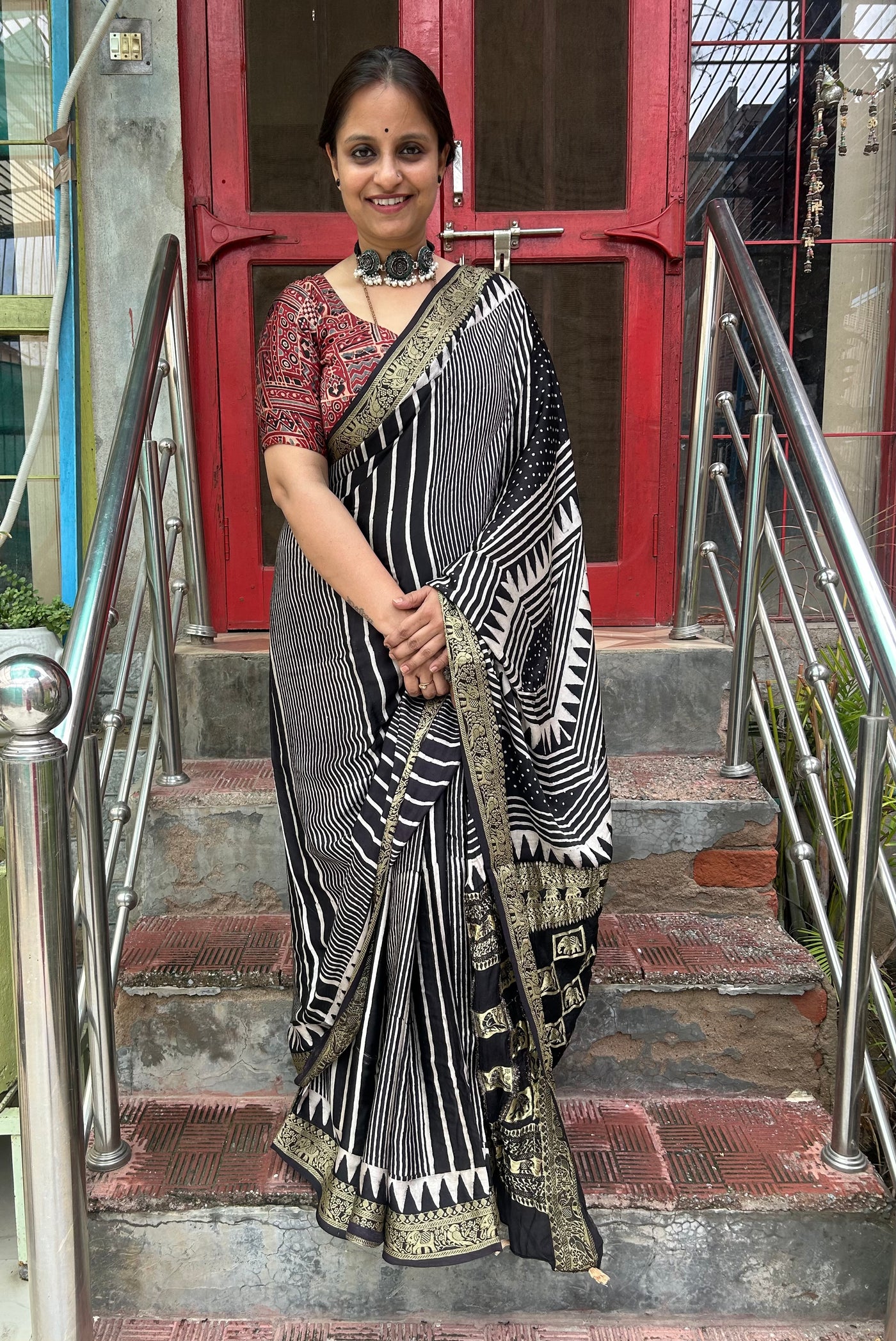 BADHAAI : Handblock Printed Ajrakh Modal Silk Meenakari Pallu Saree