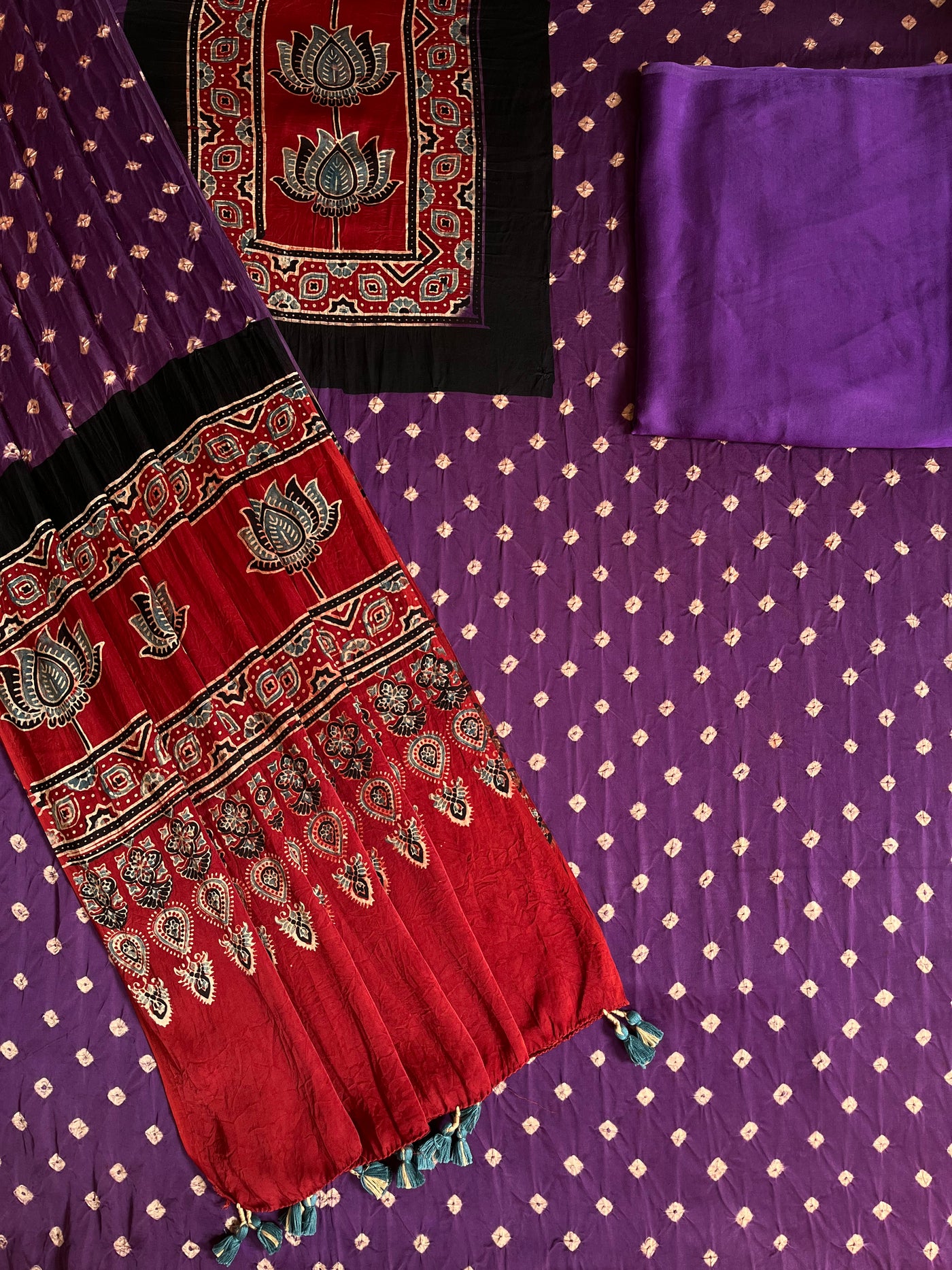 POORVI: HANDMADE RAMA GREEN BANDHANI-AJRAKH MODAL SILK 3 PIECE SUIT SET