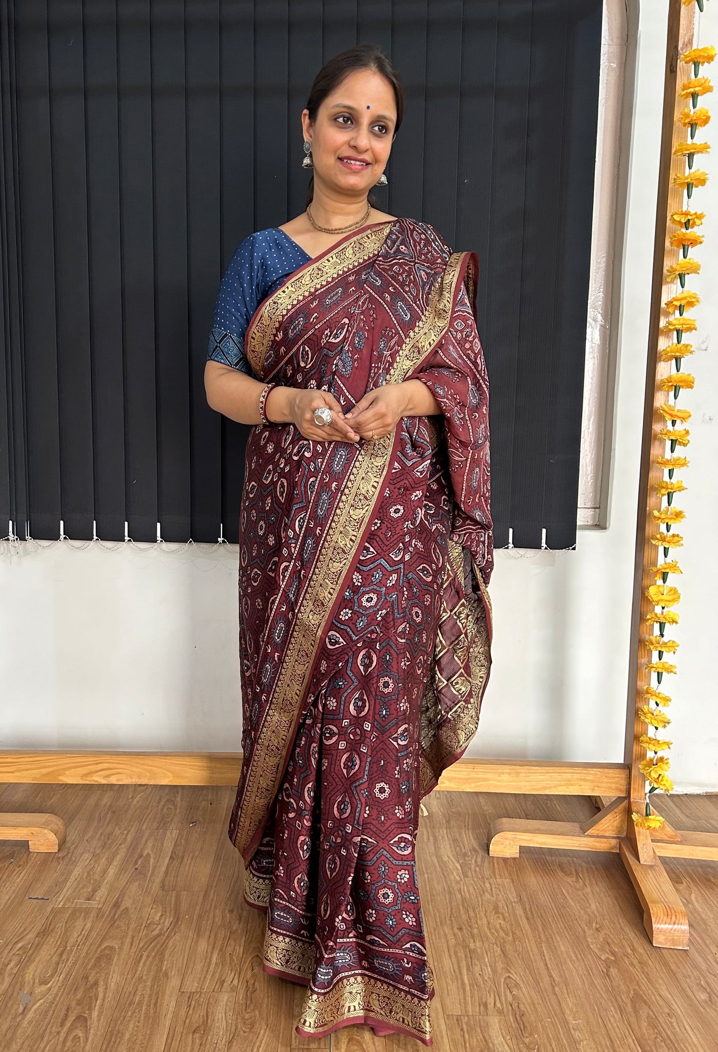 GEHNA: Handblock Printed Ajrakh Modal Silk Meenakari Pallu Saree