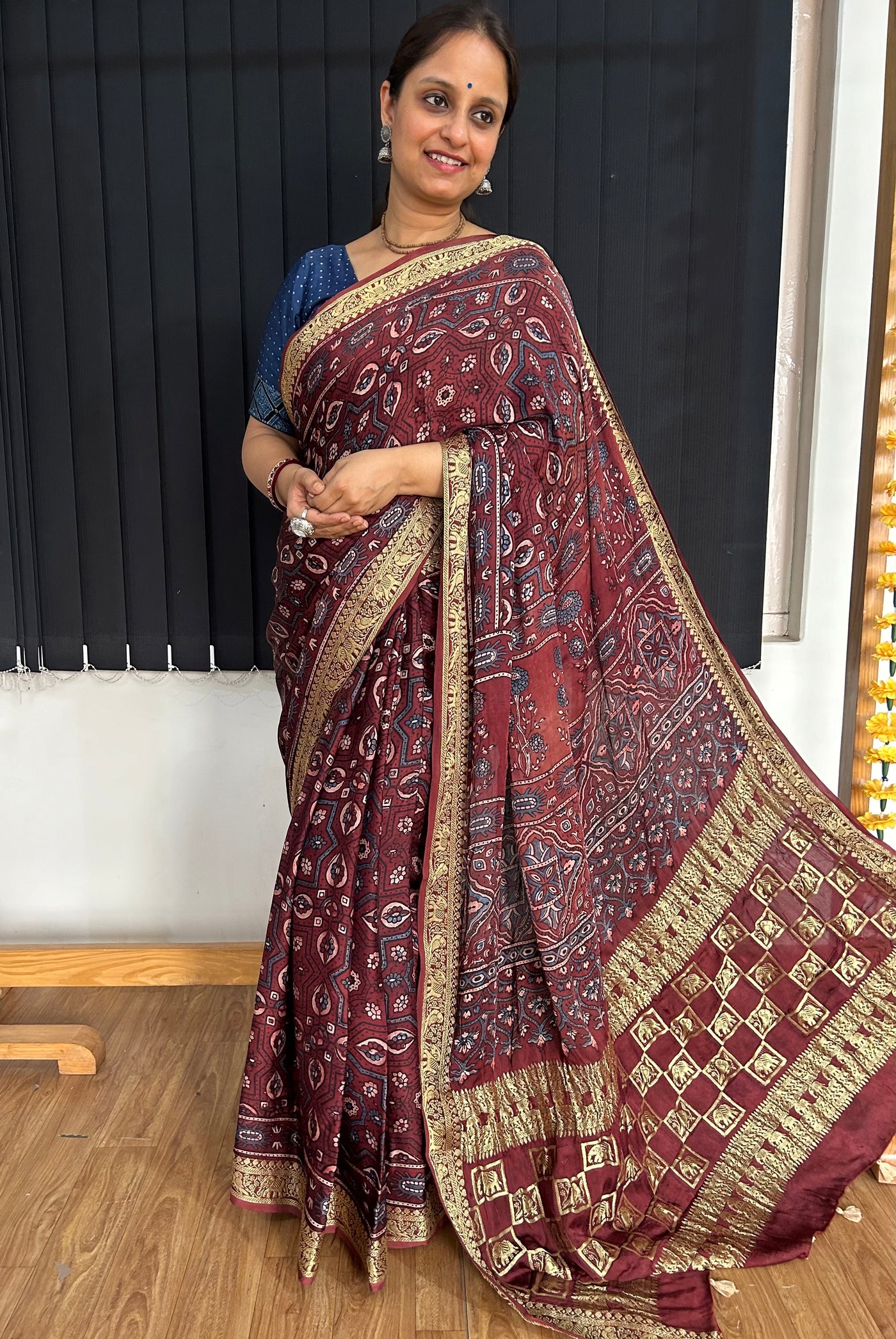 GEHNA: Handblock Printed Ajrakh Modal Silk Meenakari Pallu Saree