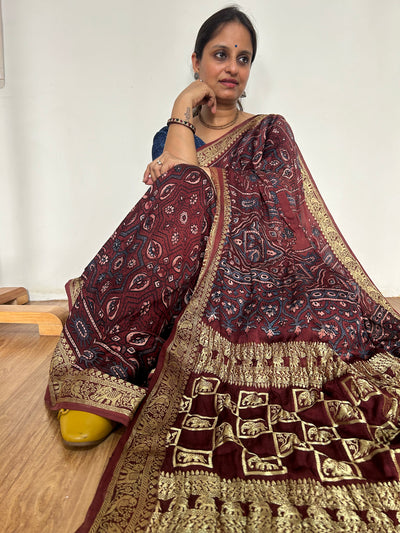 GEHNA: Handblock Printed Ajrakh Modal Silk Meenakari Pallu Saree