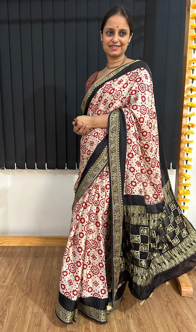 NAKSHATRA: Handblock Printed Ajrakh Modal silk Meenakari Pallu Saree