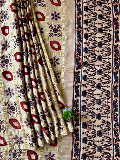 KIARA:CREAM,HANDBLOCK AJRAKH MODAL SILK GHARCHOLA SAREE