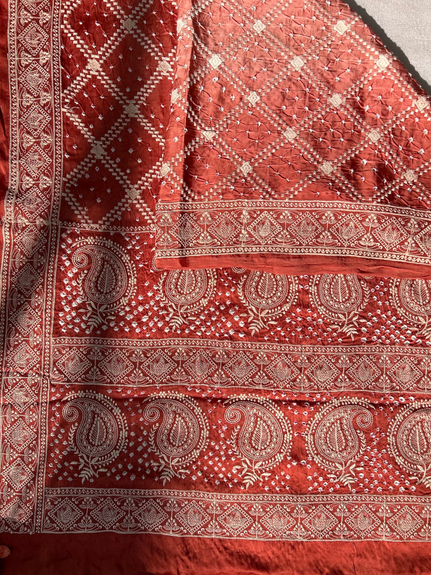 NARMADA : Handmade Bandhni Modal Silk Saree With Thread Embroidery Work.