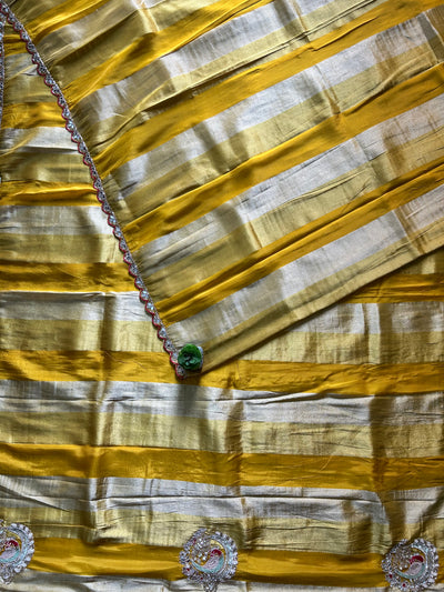 DAZZLING DIVA: PARTYWEAR TISSUE ORGANZA SAREE WITH HAND EMBROIDERY.