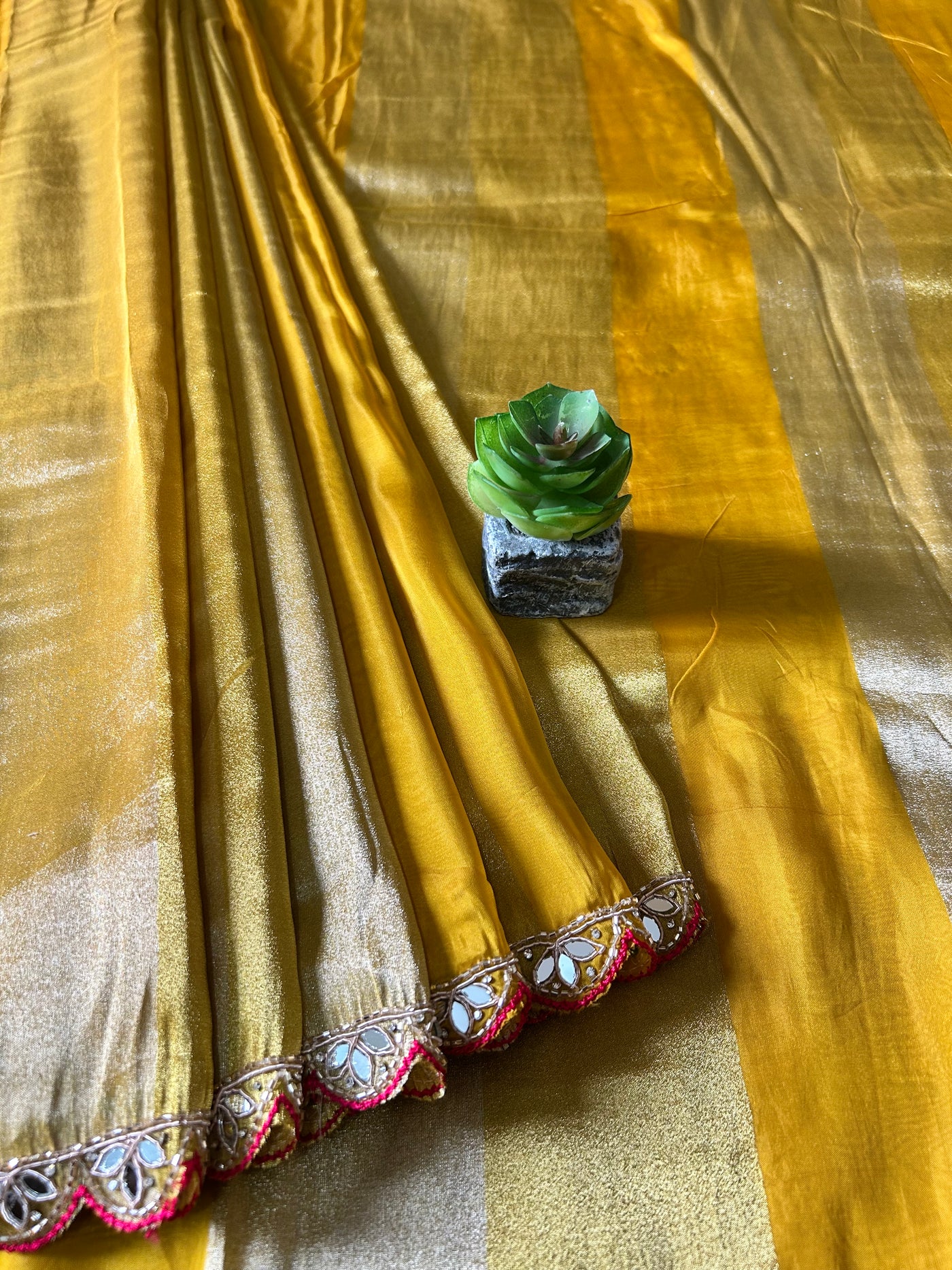 DAZZLING DIVA: PARTYWEAR TISSUE ORGANZA SAREE WITH HAND EMBROIDERY.