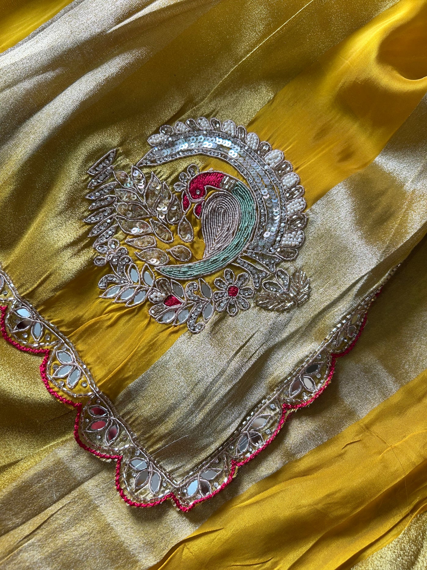 DAZZLING DIVA: PARTYWEAR TISSUE ORGANZA SAREE WITH HAND EMBROIDERY.