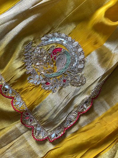 DAZZLING DIVA: PARTYWEAR TISSUE ORGANZA SAREE WITH HAND EMBROIDERY.